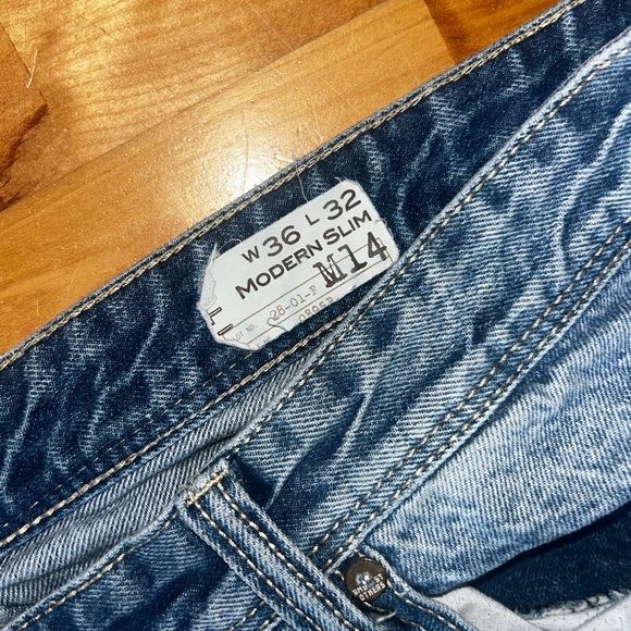 Distressed Blue Jeans - Picture 2 of 3